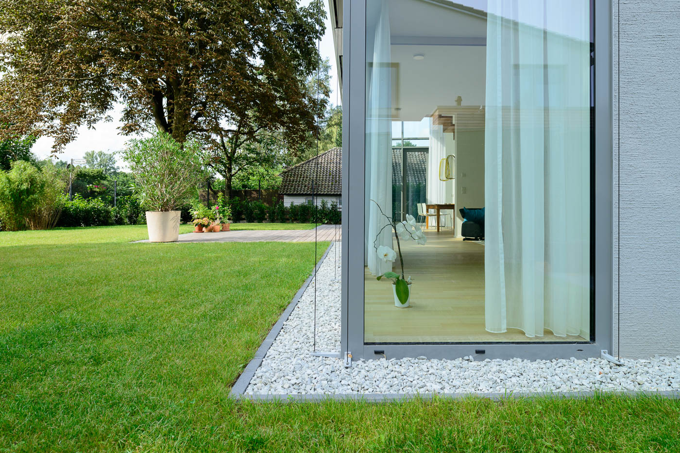 architekturfotografie Verbindung von Haus und Garten